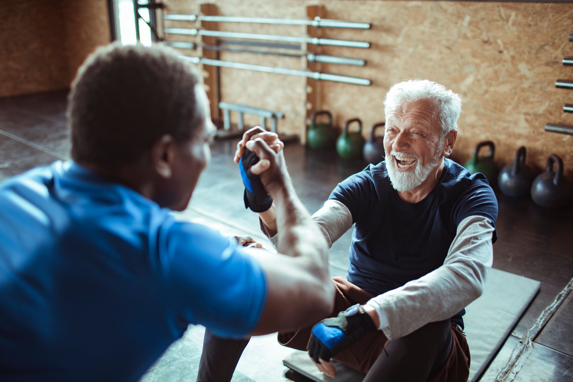 Senior Man Working out with a Personal Trainer