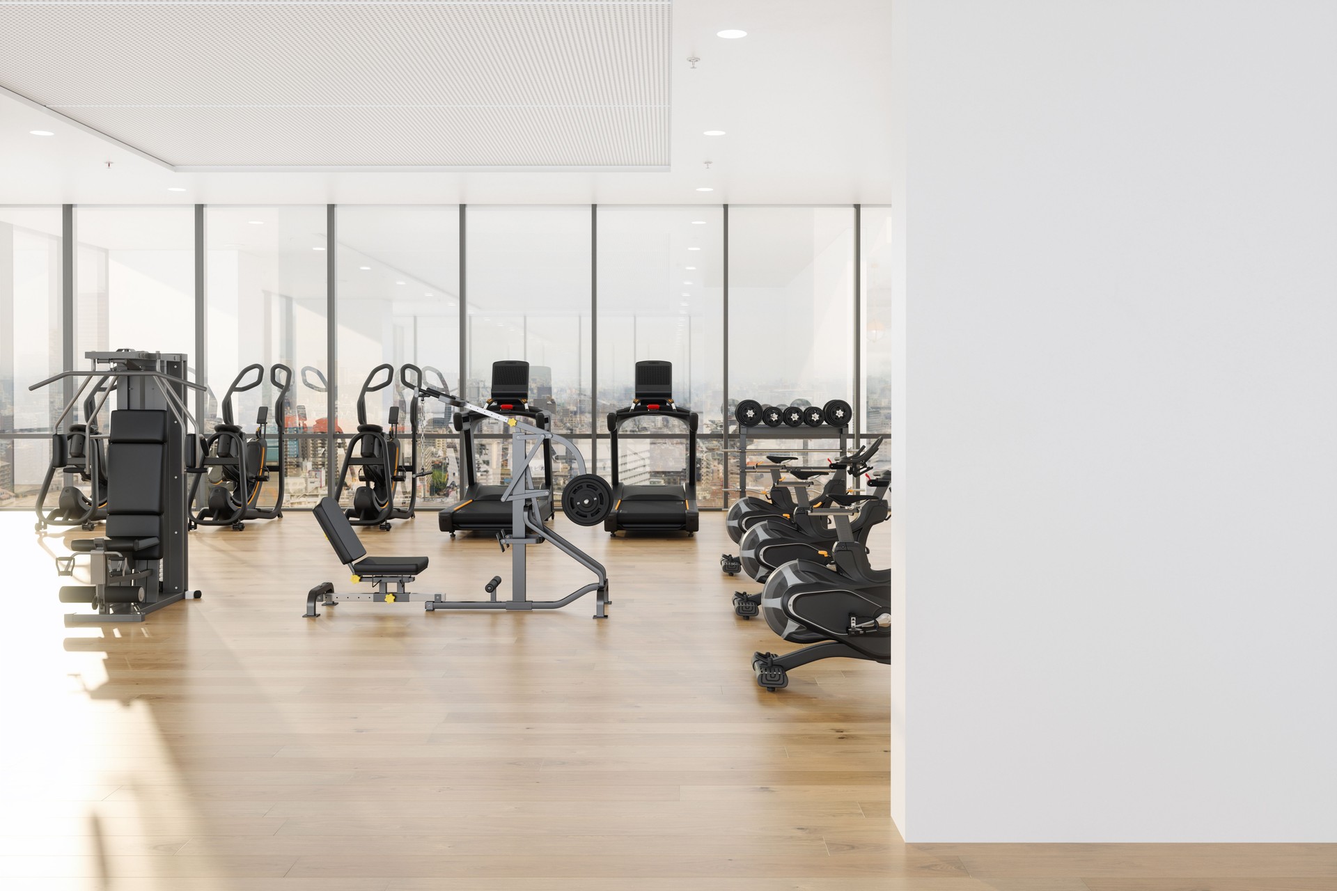 Modern Gym Interior With Treadmills, Exercise Bikes, Sports Equipments And Blank Wall